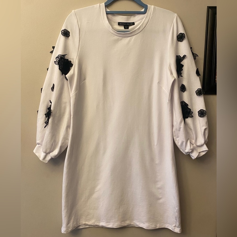 Boston Proper white oversized sweatshirt dress black appliqué flowers on sleeves